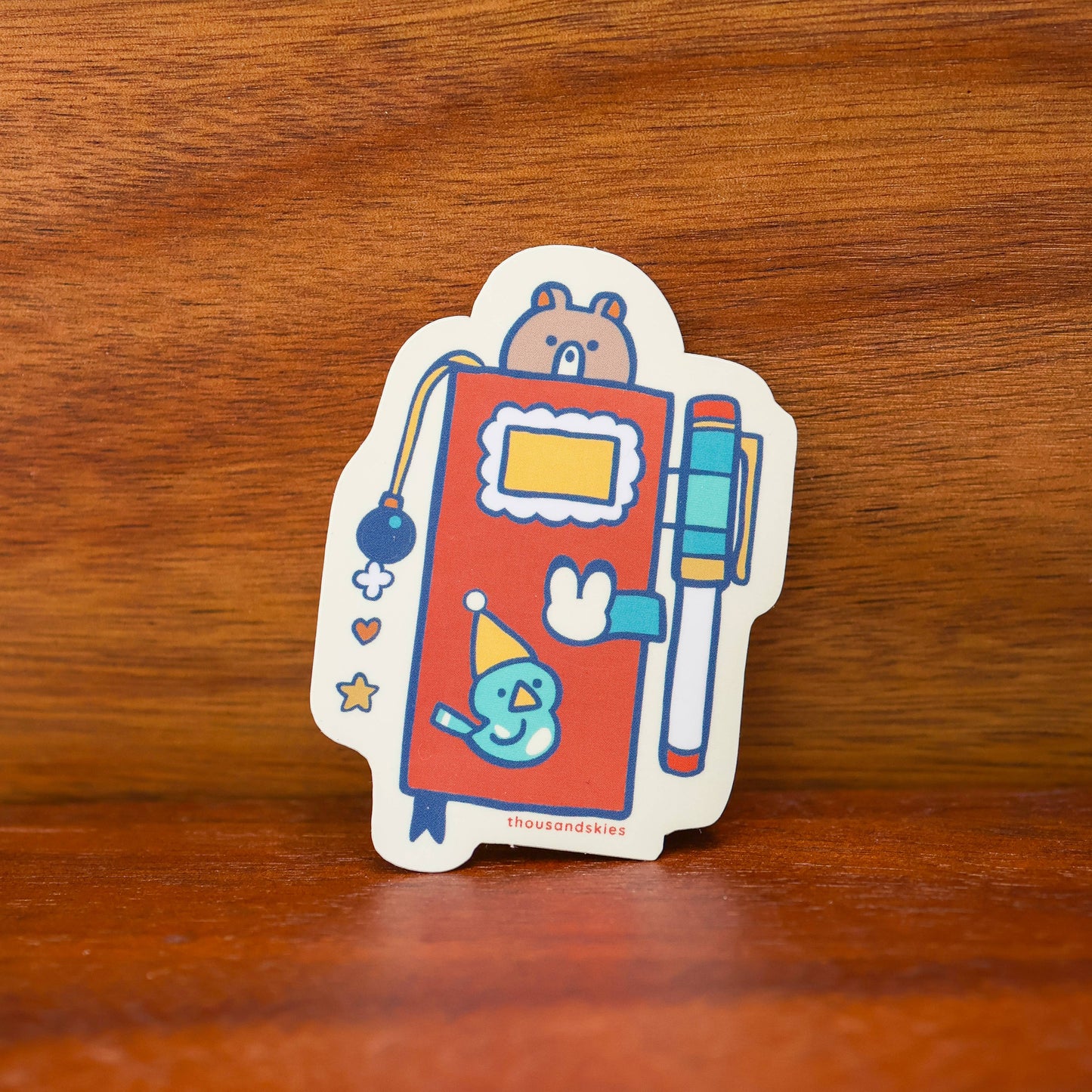Thousand Skies Vinyl Sticker (Holographic) Weekly Journal