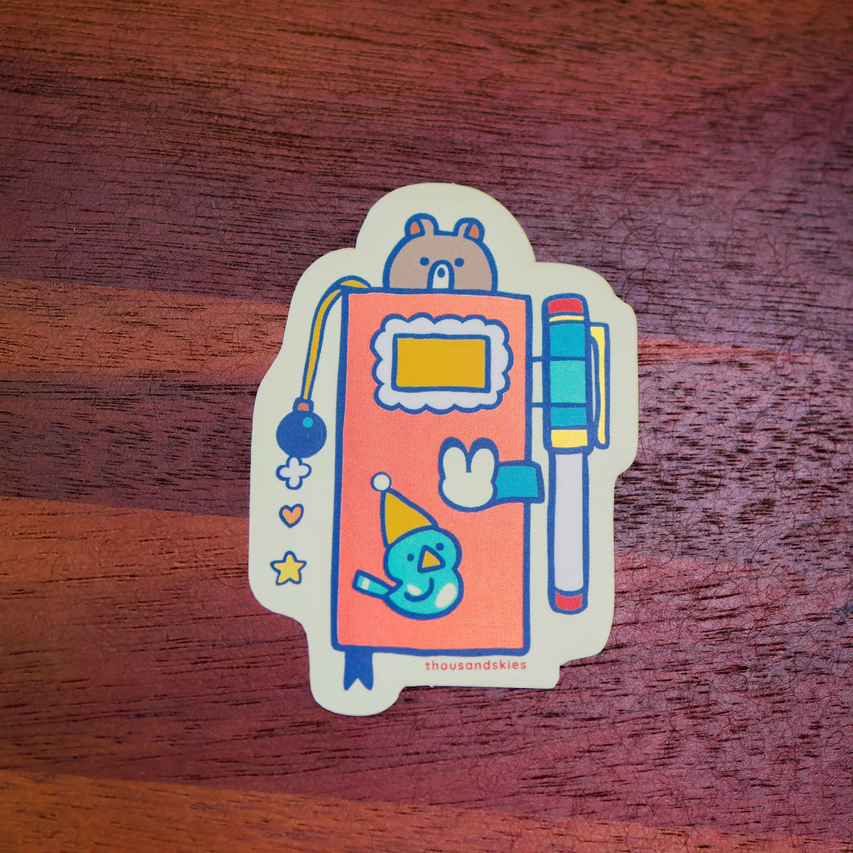 Thousand Skies Vinyl Sticker (Holographic) Weekly Journal